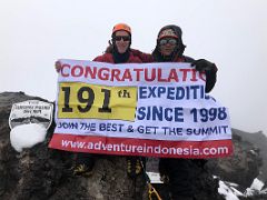 10B Jerome Ryan And Climbing Leader Poxi Jeni Dainga Holding Banner For Adventure Indonesia 191st Successful Expedition Since 1998 On Carstensz Pyramid Summit 4884m